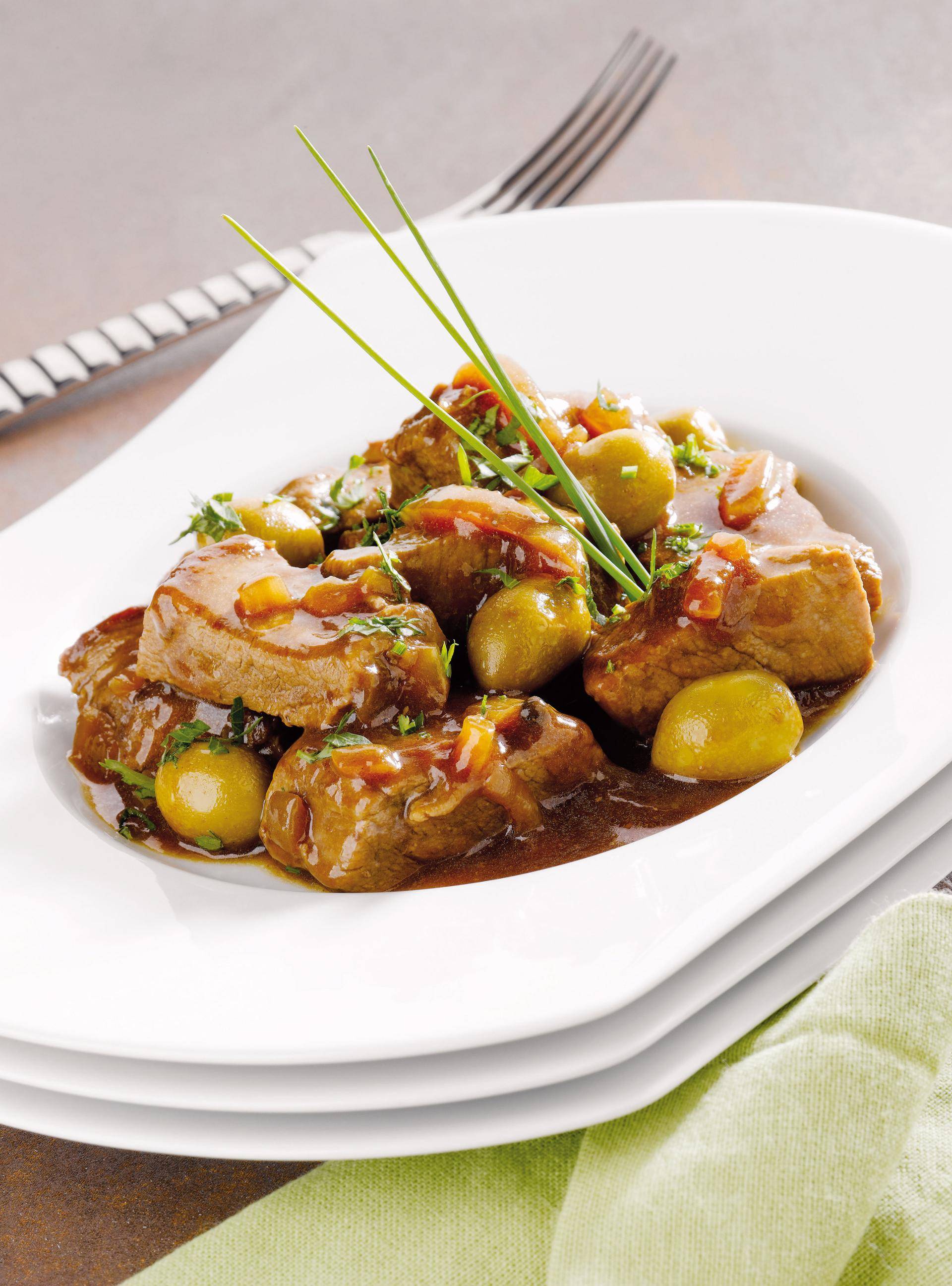 Gerührtes Schweinefleisch mit grünen Oliven - Rezepte Actifry Genius XL | Tefal